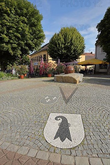 Neutorplatz with spherical fountain and floor mosaic as coat of arms of Basel bishops in Breisach