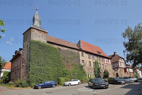 Blue hat and historic town wall in Eberbach