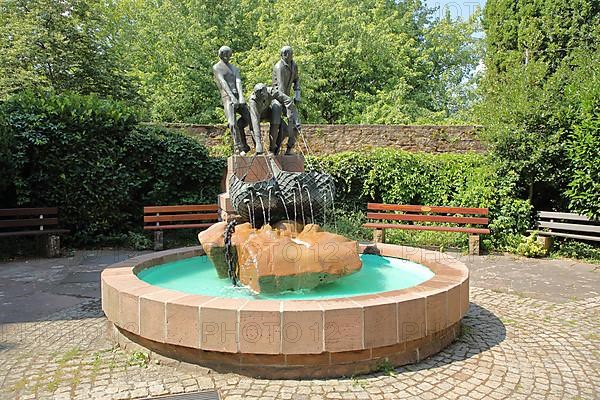 Fishing fountain with fishermen fishing in Eberbach