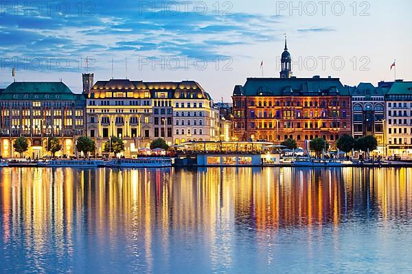 Inner Alster Lake with Hamburger Hof and Michel in the evening