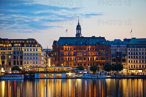 Inner Alster Lake with Hamburger Hof and Michel in the evening