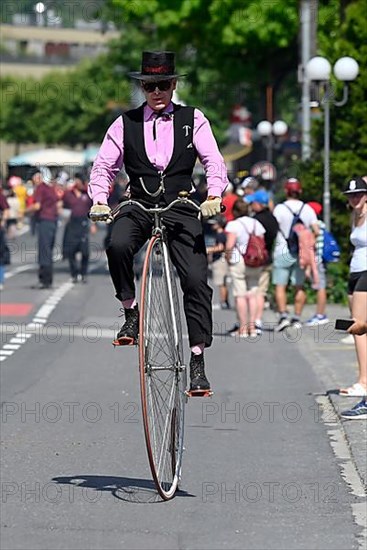 Man with penny-farthing