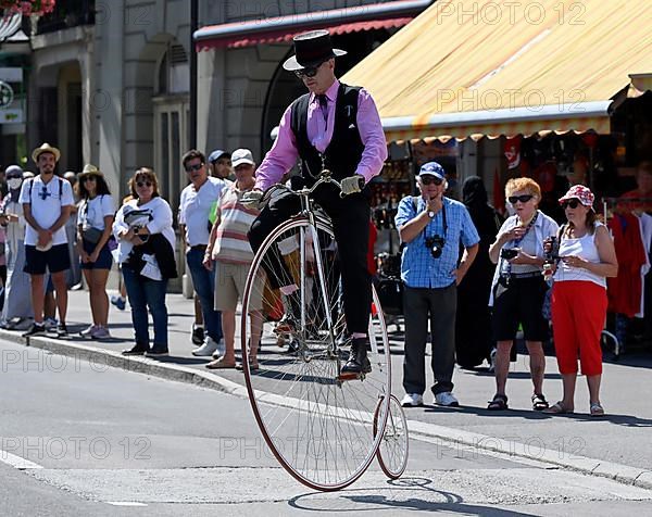 Man with penny-farthing