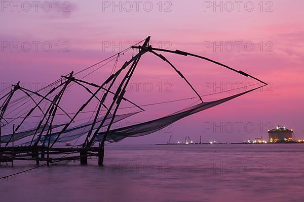 Kochi chinese fishnets on sunset. Fort Kochin