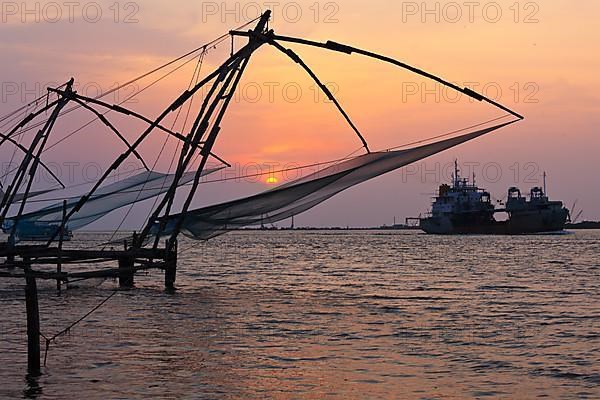 Kochi chinese fishnets on sunset. Fort Kochin