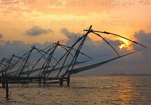 Kochi chinese fishnets on sunset. Fort Kochin