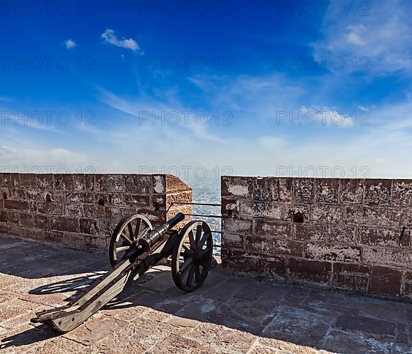 Old canon in Mehrangarh Fort overlooking city