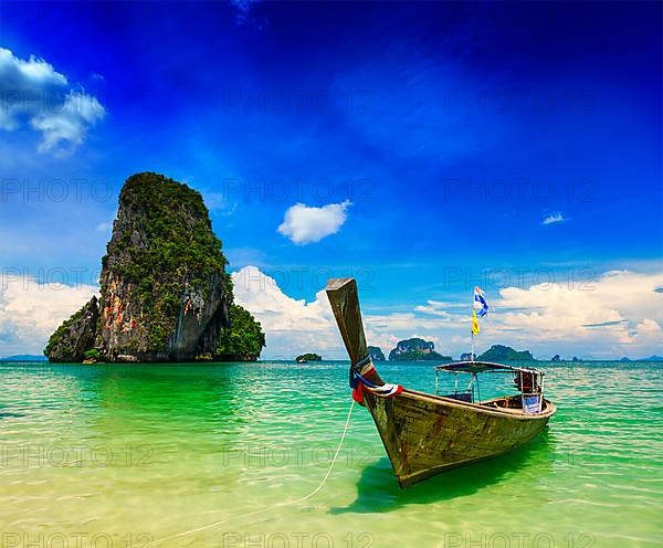 Long tail boat on tropical beach