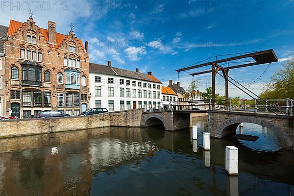 Canal with old bridge. Bruges