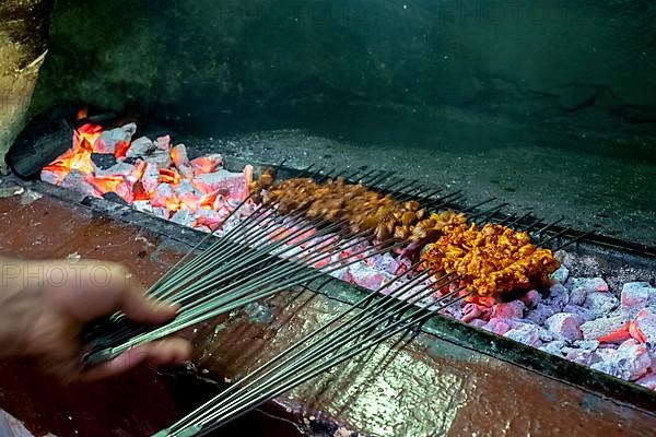 Cookink of livers on barbeque in Gumruk Han