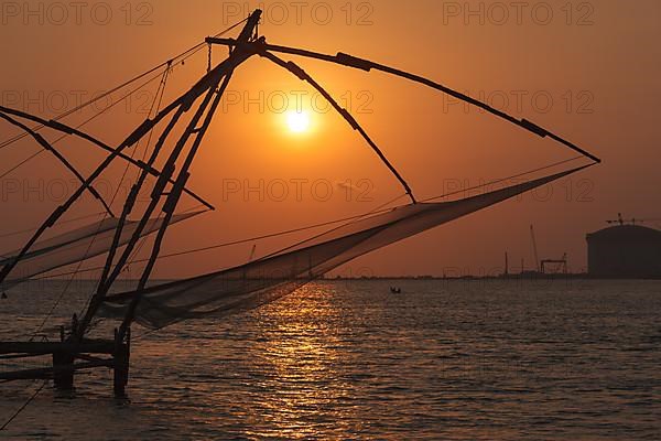 Kochi chinese fishnets on sunset. Fort Kochin