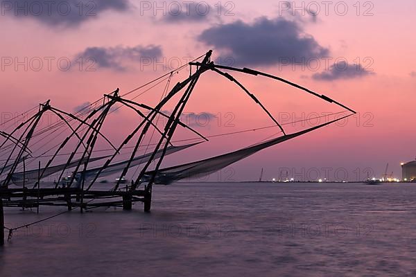 Kochi chinese fishnets on sunset. Fort Kochin