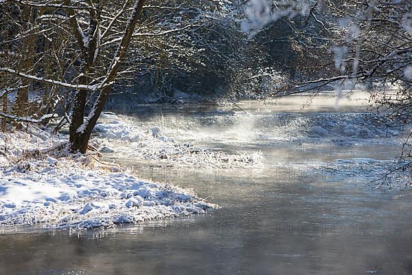 Small river as an enchanted winter landscape