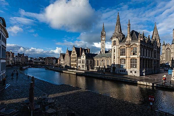 Ghent canal and Graslei street on sunset. Ghent