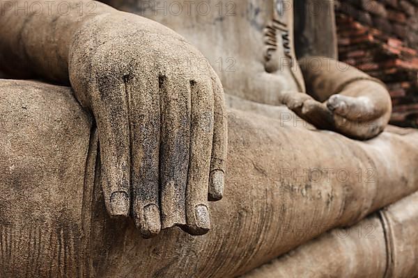 Buddha statue hand close up detail. Sukhothai