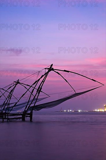 Kochi chinese fishnets on sunset. Fort Kochin