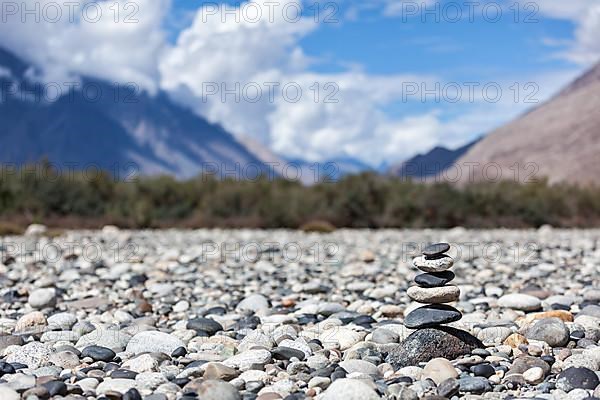 Zen balanced stones stack in Himalayas mountains