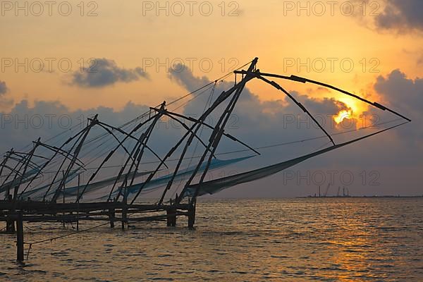 Kochi chinese fishnets on sunset. Fort Kochin