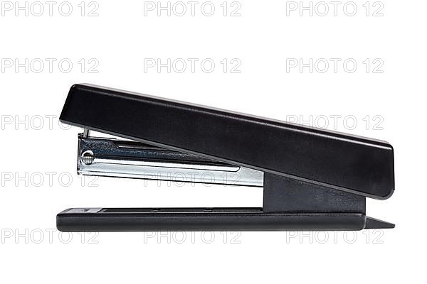 Black office stapler isolated