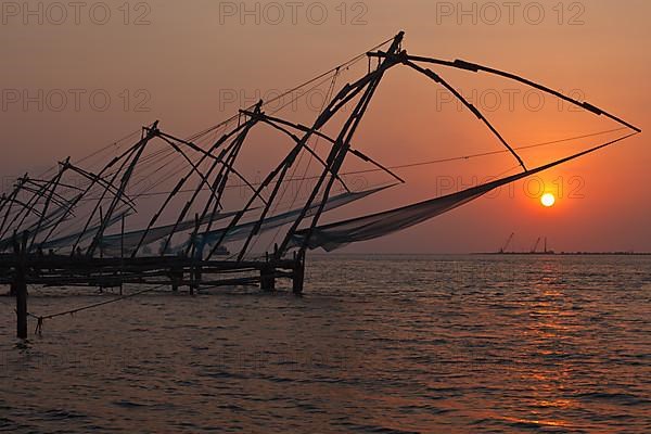 Kochi chinese fishnets on sunset. Fort Kochin