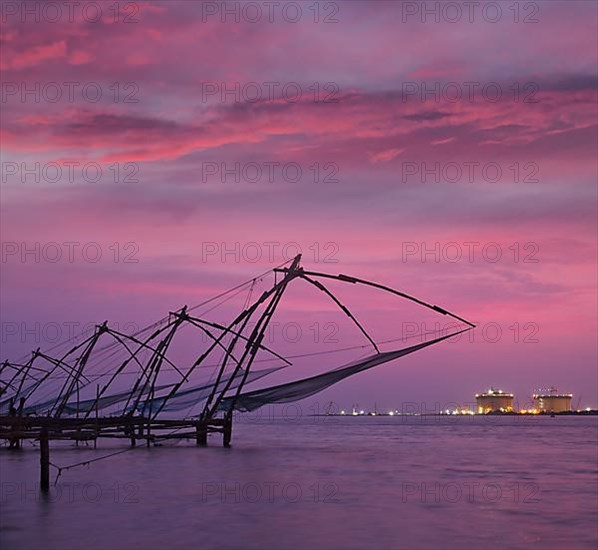 Kochi chinese fishnets on sunset. Fort Kochin