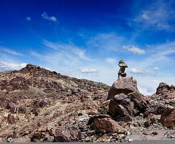 Zen balanced stones stack cairn in Himalayas mountains