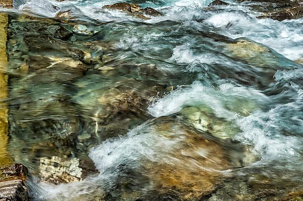 Water vortex at a weir of the Stillach river