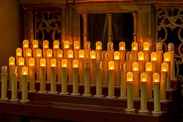 Sacrificial candles in a church