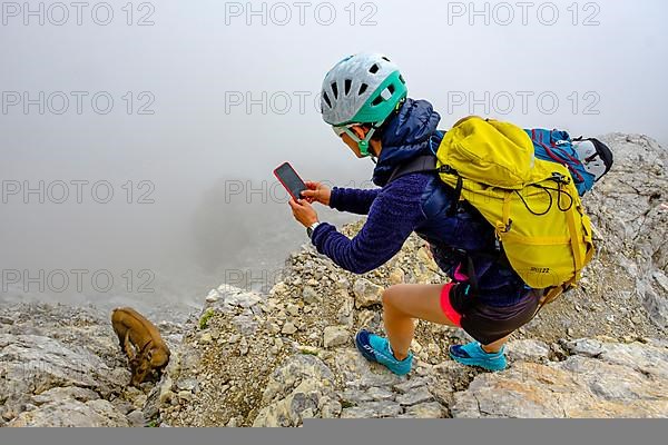 Mountaineer photographs an ibex