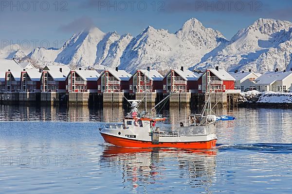 Fishing boat and Robur huts near Svolvaer