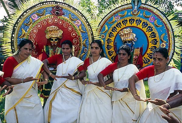 Theyyam and Thiruvathira kali dancers