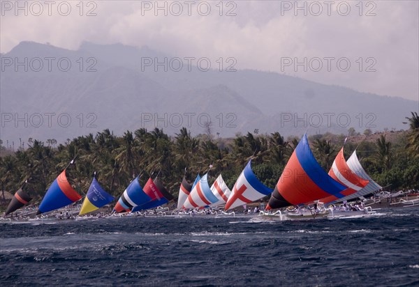 Boats with colourful sails during the Jukung Race
