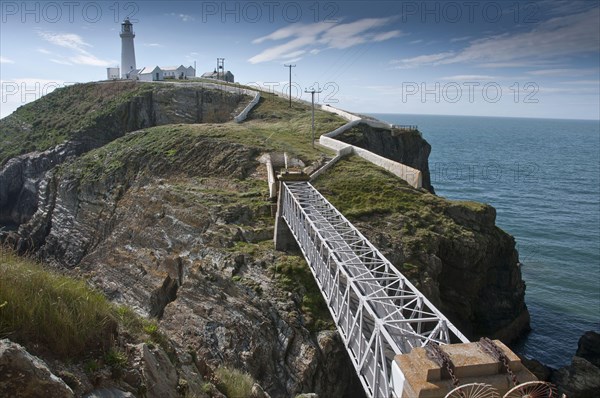 View of the suspension bridge over the channel to the island