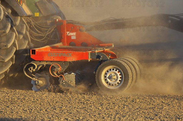 Tractor with Tume Cultipack disc harrows