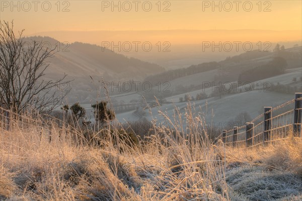 View of valley with pre-dawn frost