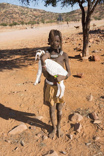 Himba child with goat