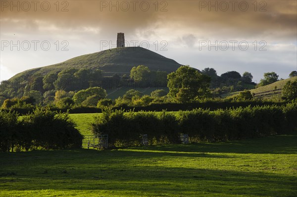 View of medieval church ruins on a hill in the evening