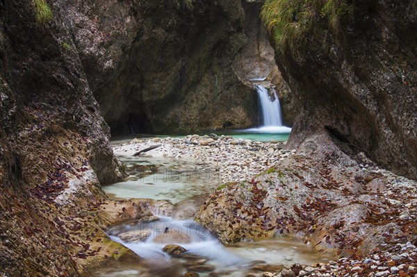 Waterfall in the Almbach river flowing through the Almbachklamm gorge in the Berchtesgaden Alps