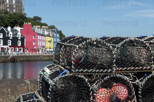 Lobster pots in the harbour of a coastal town