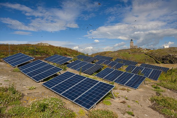 Solar panels gererating electricity to power lighthouse