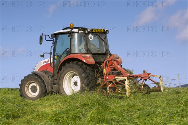 Steyr tractor with tedder