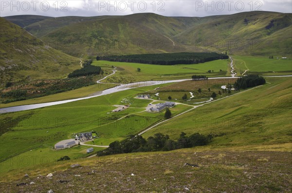 View of houses and river in valley