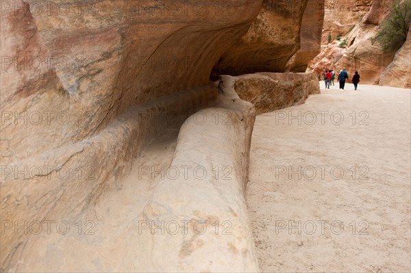 Ancient water conduit in Siq