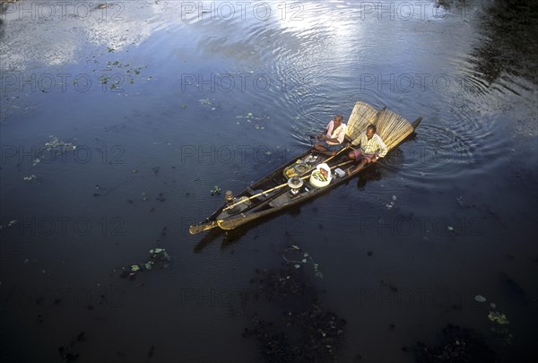 Fishermen with bamboo fishing baskets