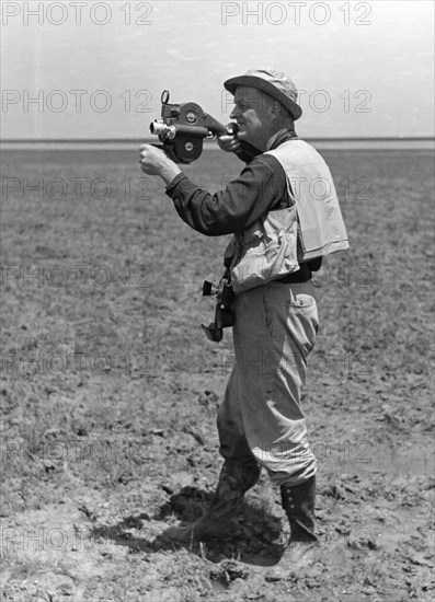 Dr Roger Tory Peterson with a film camera Coto Donana 1956