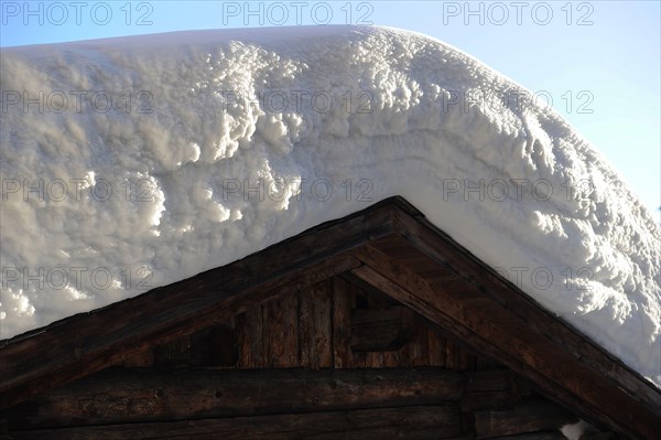 Deep snow on chalet roof
