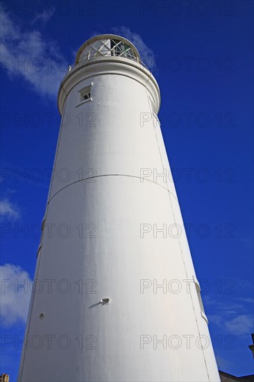 Lighthouse in seaside town