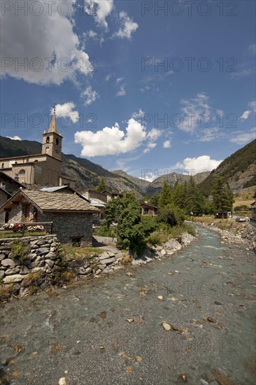 Mountain stream and village