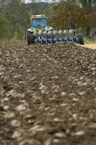 John Deere 8400 tractor with eight-furrow reversible plough