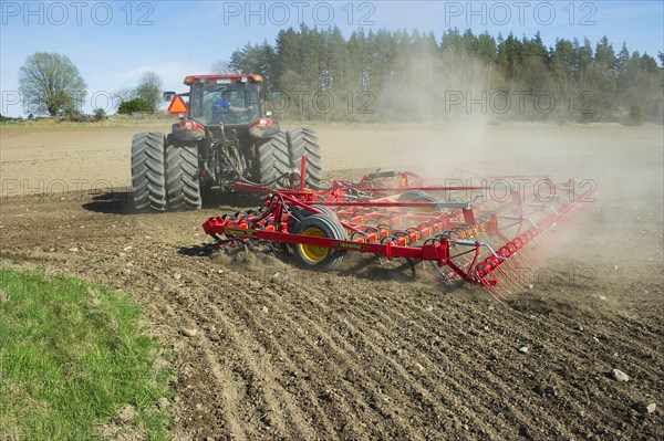 John Deere 7720 tractor with Vaderstad NZ-Aggressive-800 harrows